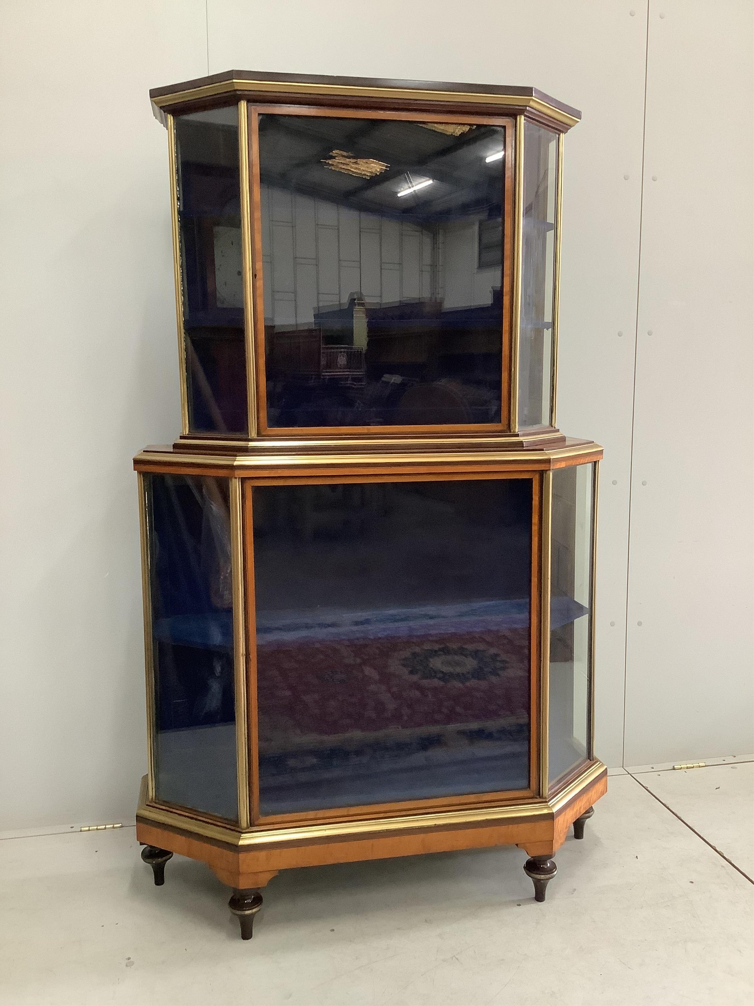 A 19th century satinwood banded brass mounted vitrine, width 110cm, depth 36cm, height 182cm. Condition - good